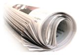 rolled newspaper